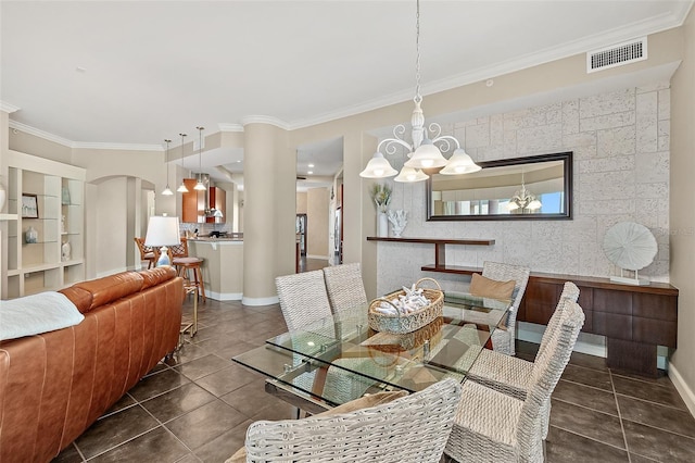 dining room with arched walkways, a chandelier, visible vents, baseboards, and crown molding