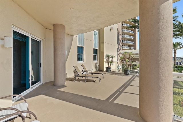 view of patio / terrace with a balcony