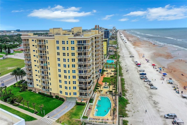 bird's eye view with a beach view and a water view