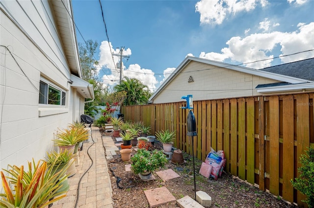 view of yard with a patio area and fence