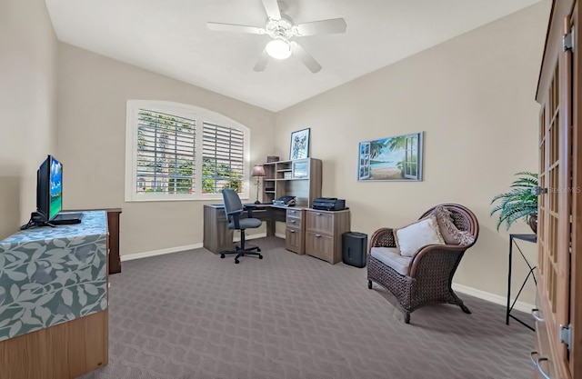 carpeted office with ceiling fan and baseboards