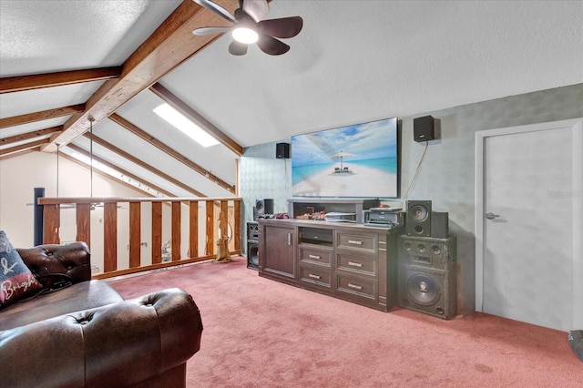 living room featuring carpet floors, ceiling fan, lofted ceiling with beams, and a textured ceiling