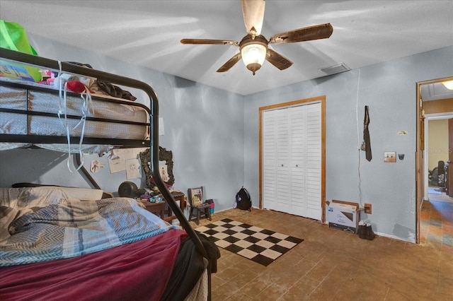 bedroom featuring visible vents and a ceiling fan