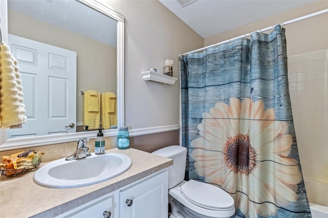 full bath with curtained shower, visible vents, vanity, and toilet