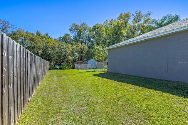 view of yard featuring a fenced backyard