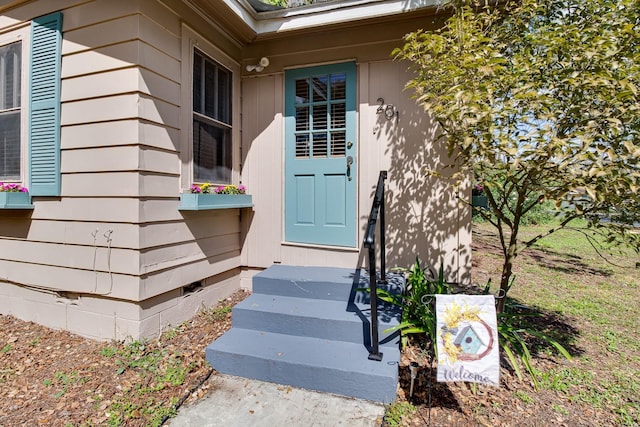 doorway to property featuring crawl space