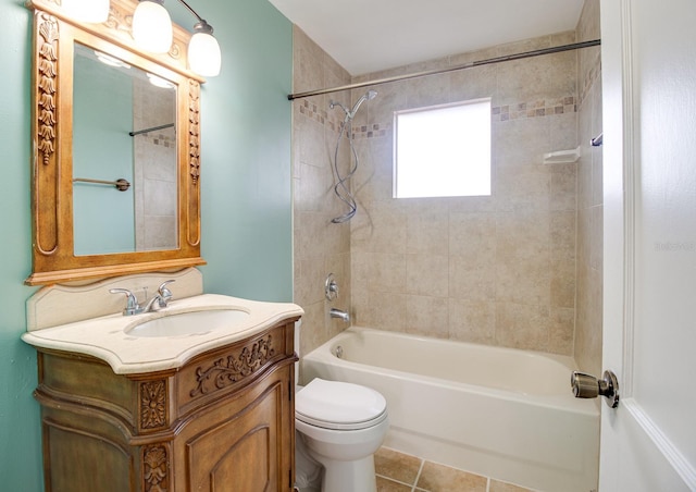 full bathroom with  shower combination, tile patterned flooring, vanity, and toilet