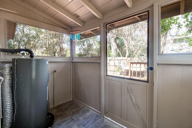 unfurnished sunroom with wooden ceiling, water heater, and lofted ceiling with beams