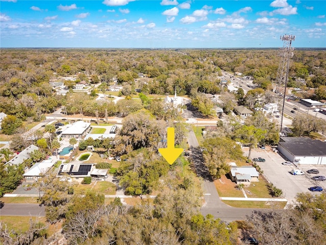 aerial view with a wooded view