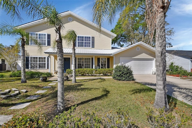 traditional-style home featuring a garage, concrete driveway, a front yard, and central air condition unit