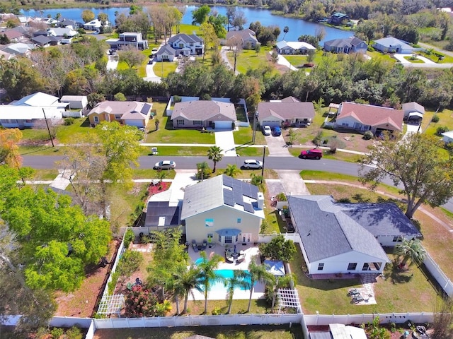 aerial view featuring a water view and a residential view