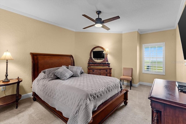 bedroom with ornamental molding, light carpet, baseboards, and a ceiling fan