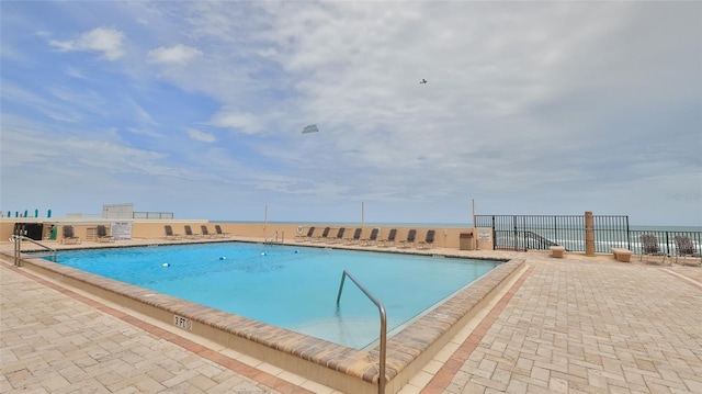 3051 S Atlantic Ave Unit 2206, Daytona Beach, FL 32118 - pool featuring fence