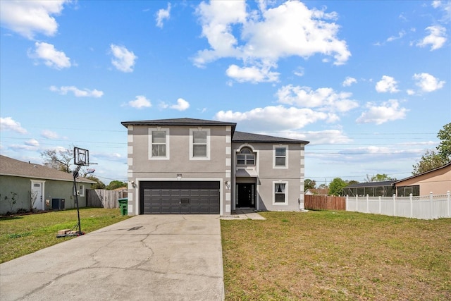 view of front of home with stucco siding, driveway, a front lawn, and fence