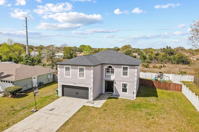 view of front of house featuring driveway, a front lawn, a playground, fence, and a garage