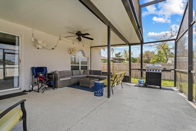 sunroom / solarium with ceiling fan