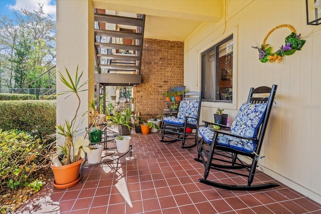 view of patio / terrace featuring fence