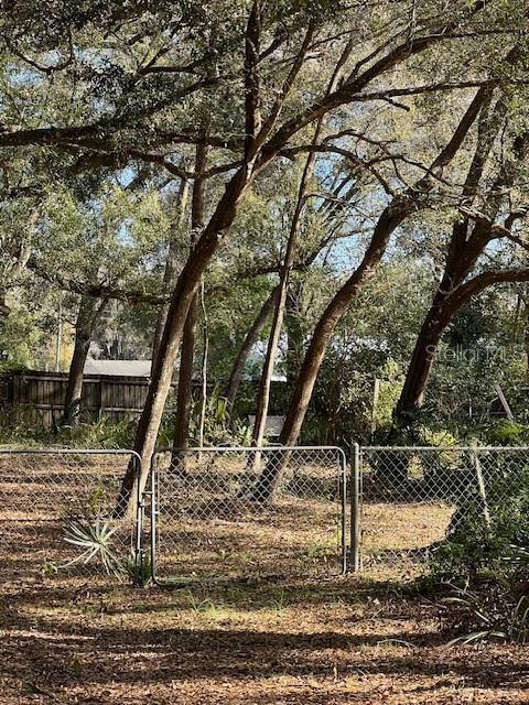 view of yard with a gate and fence