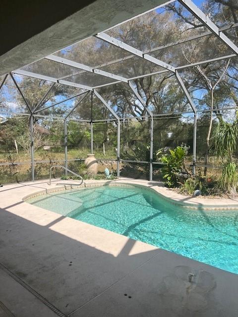 outdoor pool featuring a patio