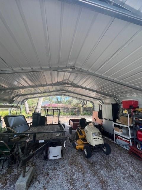 view of vehicle parking with a carport