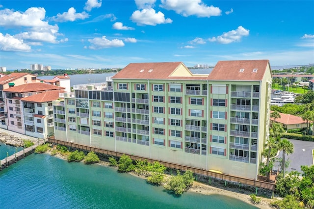 view of building exterior featuring a water view