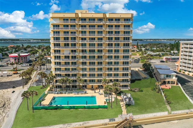 view of building exterior with a water view