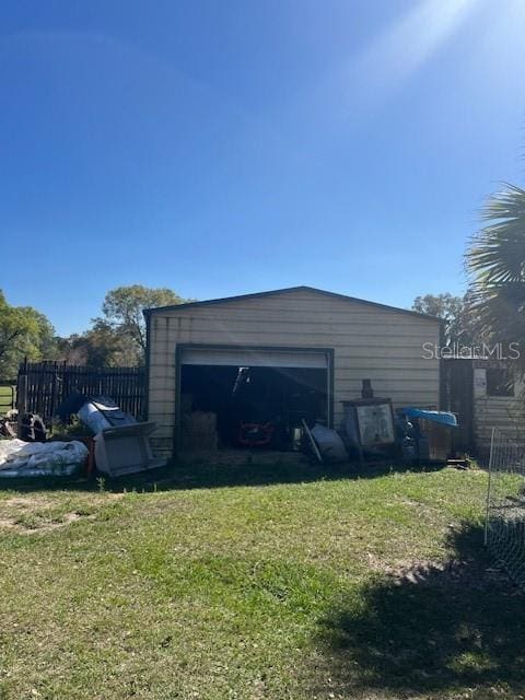 detached garage with fence