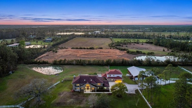 bird's eye view with a rural view and a water view