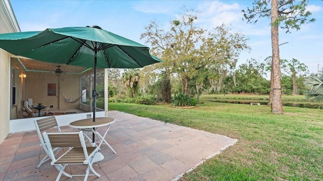 view of patio / terrace with ceiling fan