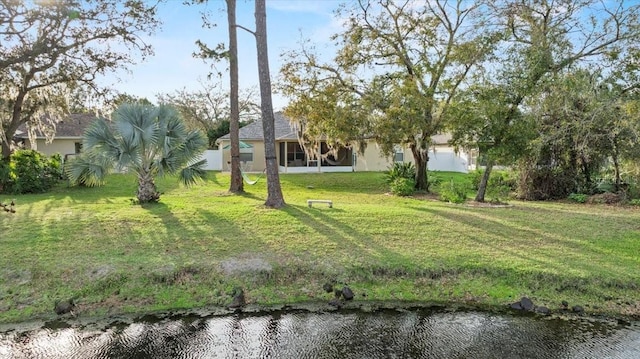 view of yard featuring a sunroom