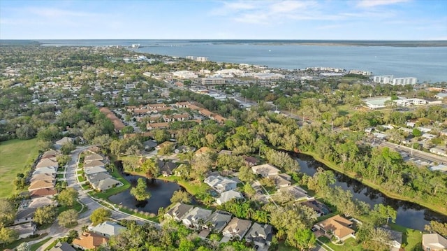 bird's eye view featuring a residential view and a water view