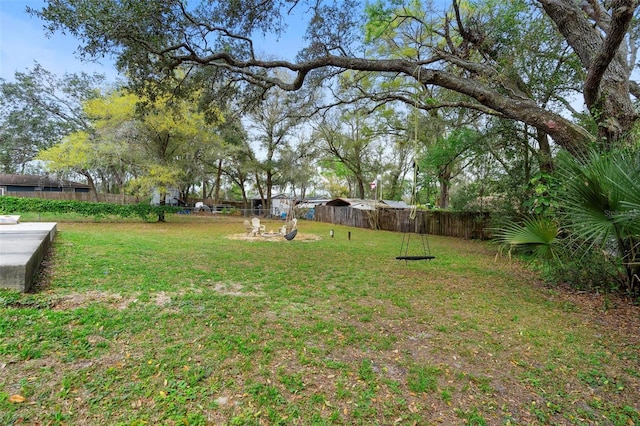 view of yard featuring fence