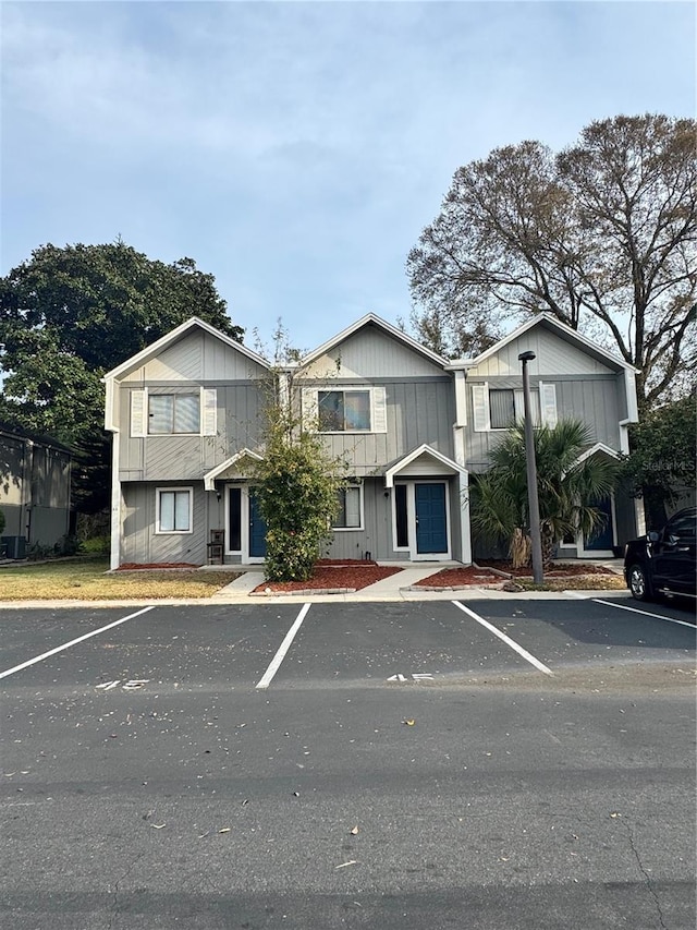 view of front of home with uncovered parking