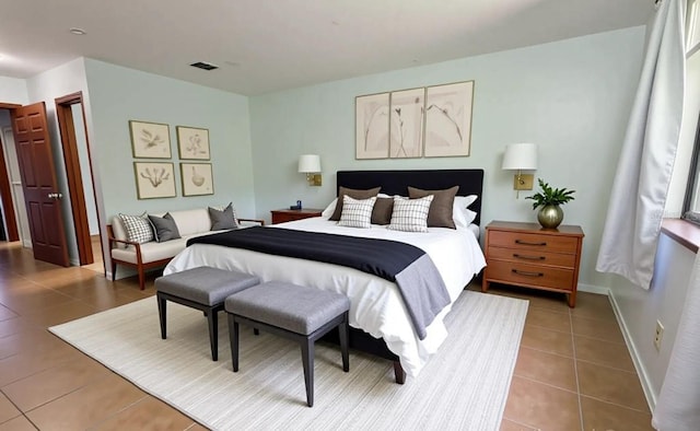 3960 Willow Trail Run Unit 45, Port Orange, FL 32127 - tiled bedroom with baseboards
