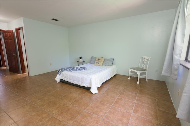 3960 Willow Trail Run Unit 45, Port Orange, FL 32127 - bedroom featuring light tile patterned flooring