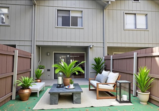 3960 Willow Trail Run Unit 45, Port Orange, FL 32127 - back of house featuring an outdoor hangout area, a fenced backyard, and a patio