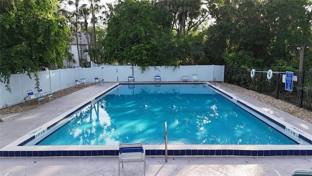 3960 Willow Trail Run Unit 45, Port Orange, FL 32127 - community pool featuring a fenced backyard