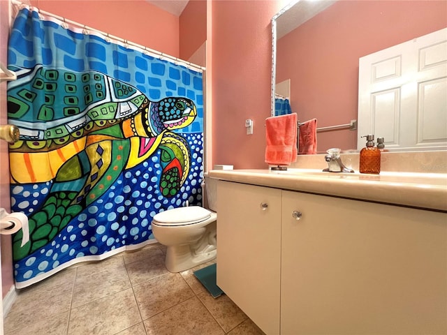 full bath featuring toilet, curtained shower, tile patterned flooring, and vanity