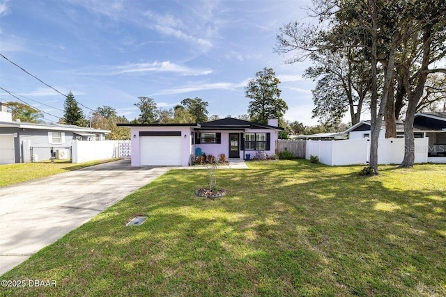 ranch-style home featuring concrete driveway, a front lawn, an attached garage, and fence