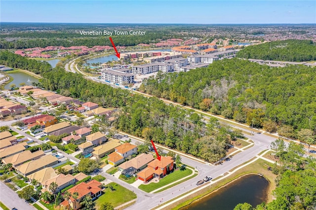 drone / aerial view with a water view