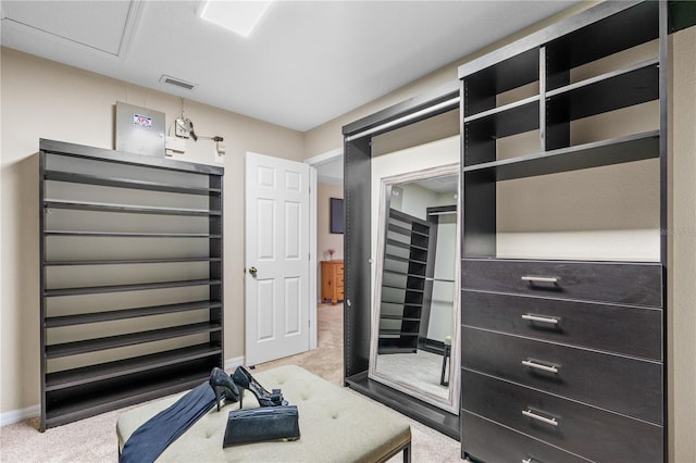 spacious closet with visible vents and carpet flooring