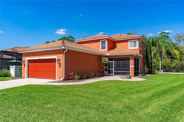 mediterranean / spanish-style home with stucco siding, driveway, a front lawn, a garage, and a tiled roof