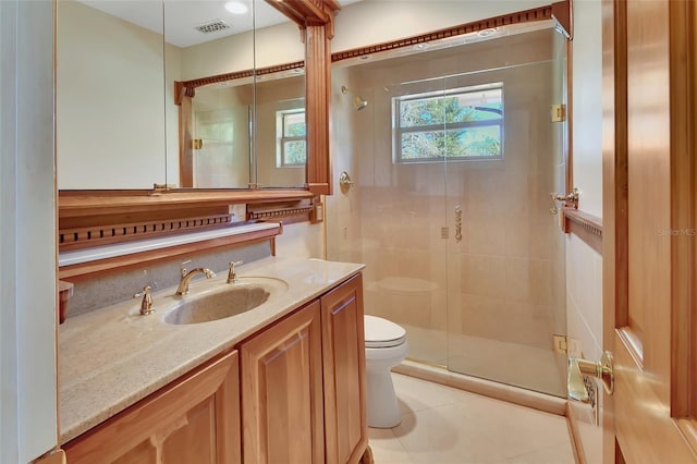 full bath featuring toilet, a shower stall, visible vents, and vanity