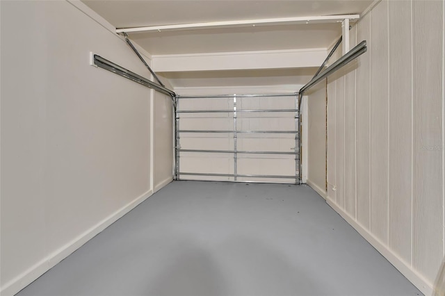 garage featuring baseboards