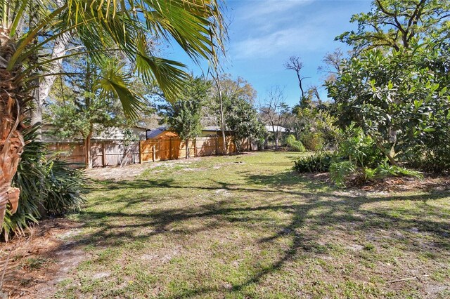 view of yard with fence