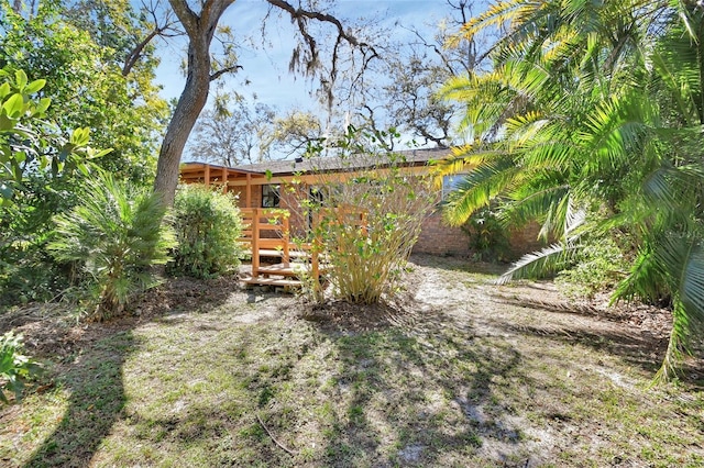 view of yard with a deck