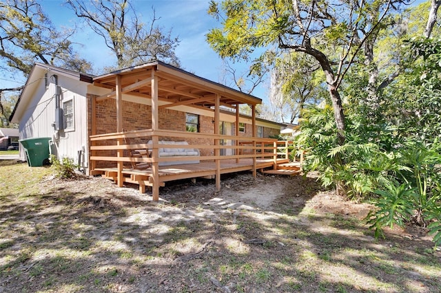 exterior space with brick siding