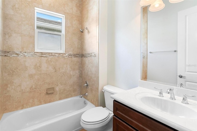 full bathroom featuring shower / bath combination, vanity, and toilet