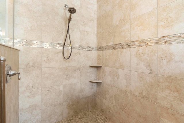 details with a tile shower