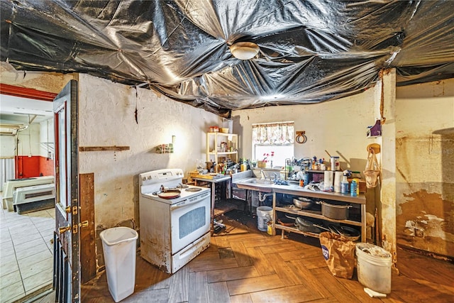 kitchen featuring white electric range